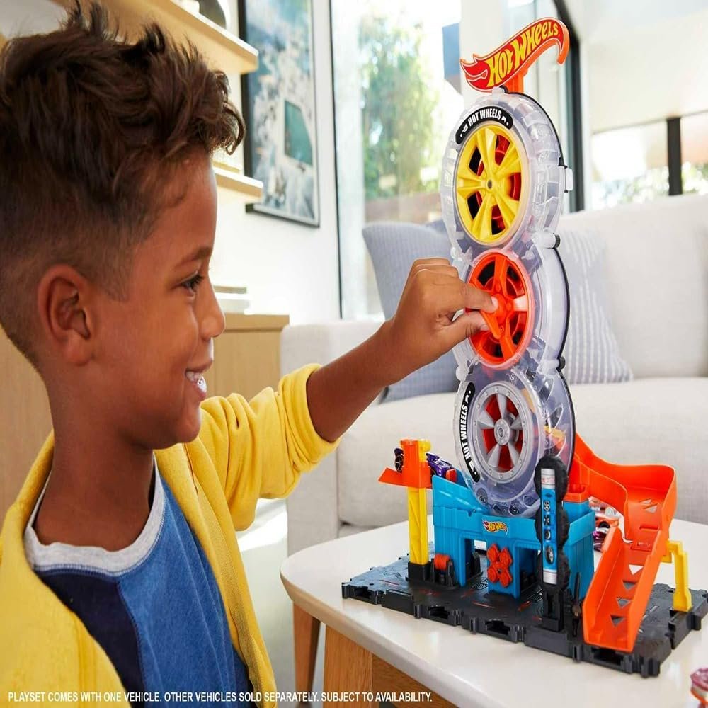 Hot Wheels City Super Twist Tire Shop | Taller de Ruedas Giratorias con Coche Incluido - Imagen 2
